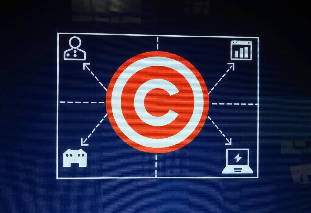 Simbolo di copyright e proprietà intellettuale su uno schermo digitale.